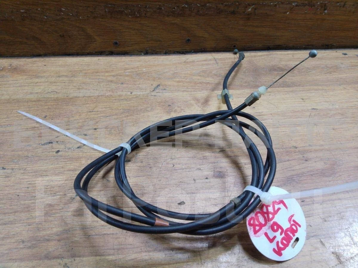 Трос капота Митсубиси Лансер 9  (CS)