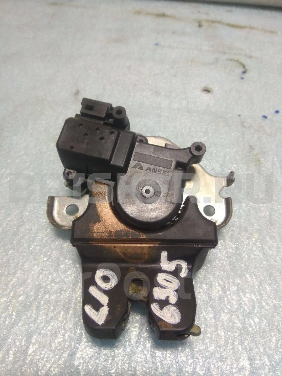 Замок багажника Митсубиси Лансер 10  (CX,CY)