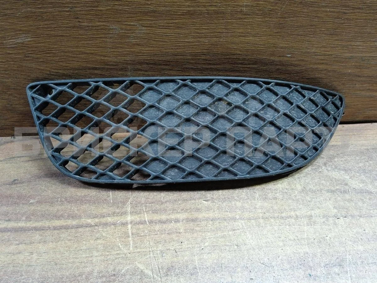 Накладка ПТФ левая Митсубиси Лансер 10  (CX,CY)