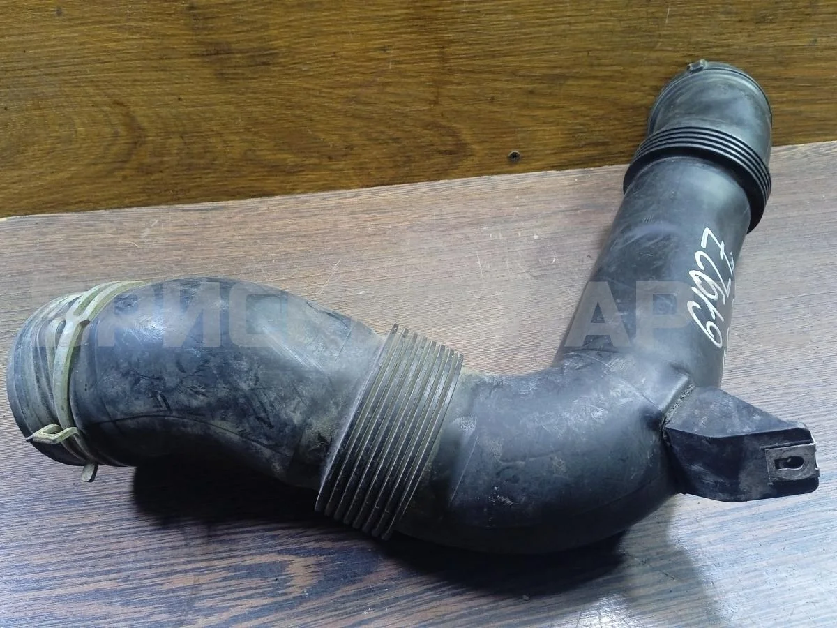 Патрубок фильтра Фольксваген Пассат Б6