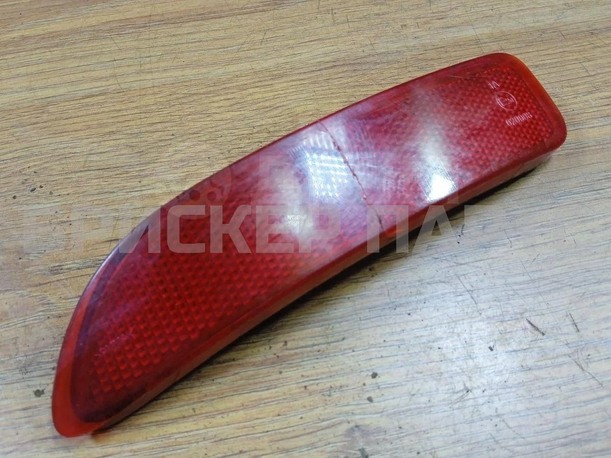 Катафот в бампер лев Рено Логан 1  LS0G/LS12