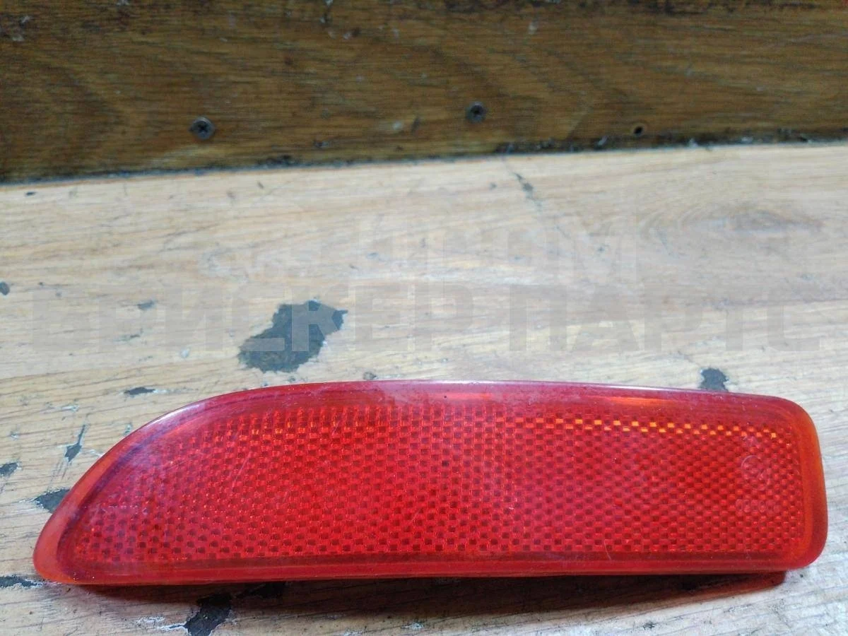 Катафот в бампер лев Рено Логан 1  LS0G LS12 рестайлинг