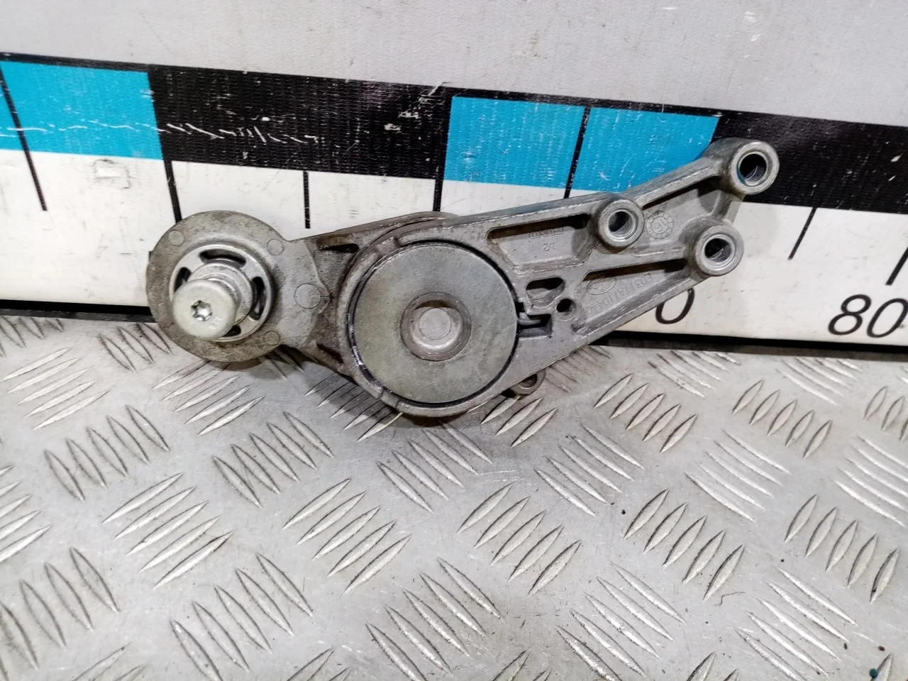 [Б/У] Натяжитель приводного ремня Audi - Без ролика [ХОРОШЕЕ] [Код: 00541039 ]