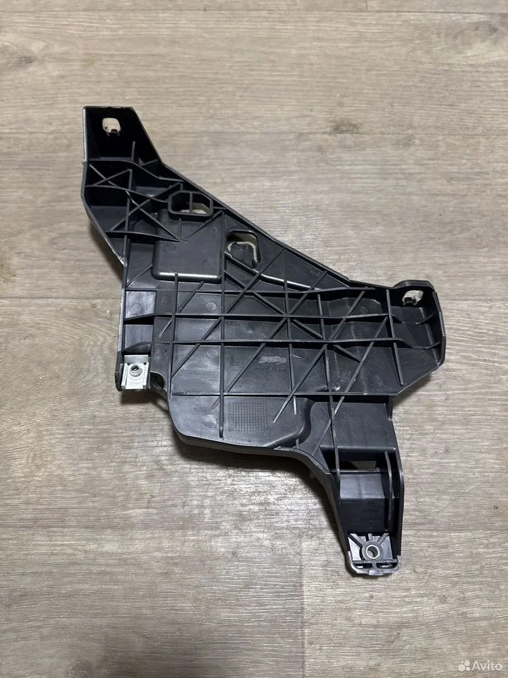 Кронштейн под фару левый vag