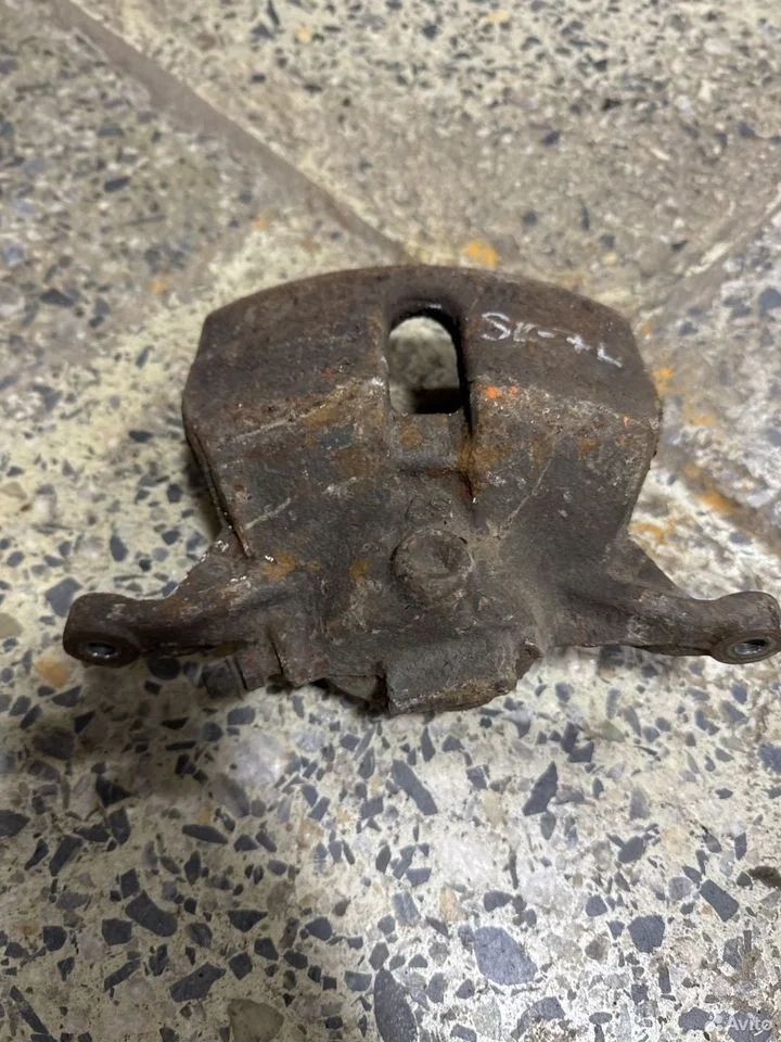 Суппорт тормозной передний левый vag