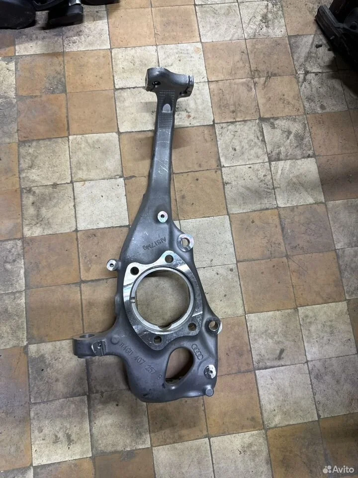 Поворотный кулак передний левый vag