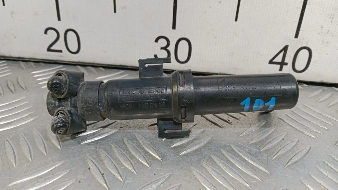 [Б/У] Форсунка омывателя левой фары Audi [Код: 00399960 ]