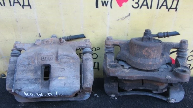 Суппорт Nissan Qashqai 41011JD00A J10 MR20, передний левый