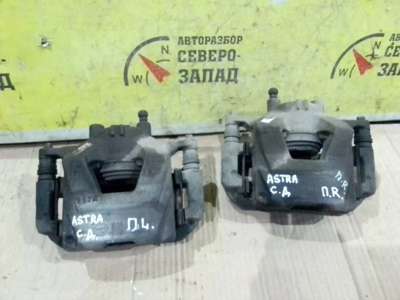 Суппорт Opel Astra 13301189 J A14NET, передний левый