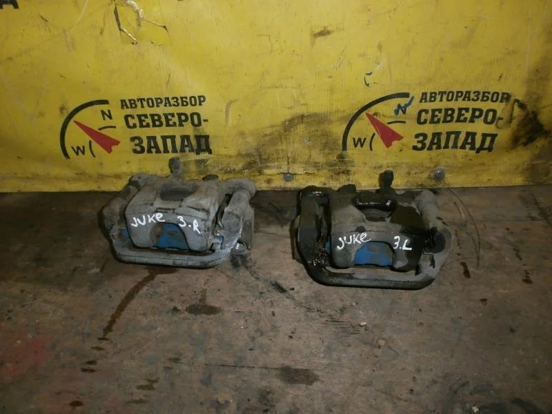 Суппорт тормозной Nissan Juke 44001EM11A YF15 HR16DE, задний правый