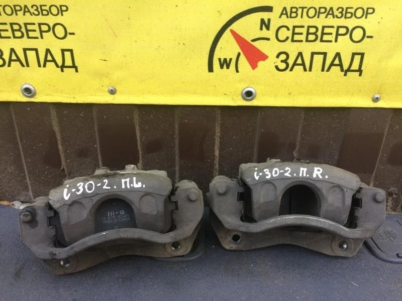 Суппорт Hyundai I30 581301H000 FD G4FC, передний правый