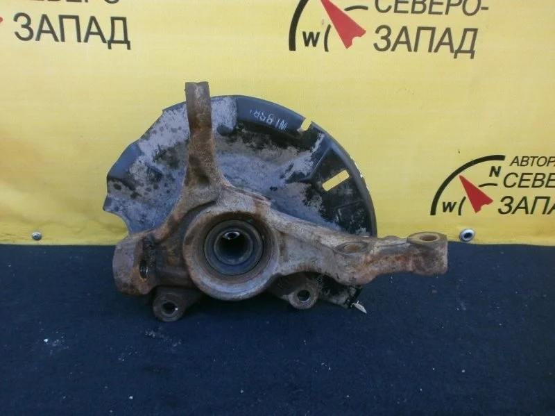 Поворотный кулак Kia Rio 517160U000 QB G4FC, передний правый