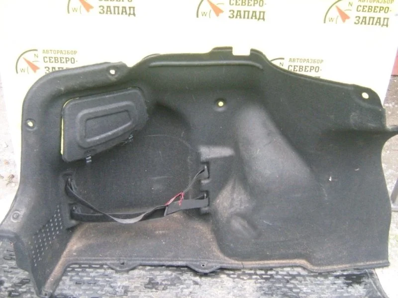 Обшивка багажника Kia Rio 857304Y000WK QB G4FC, левая