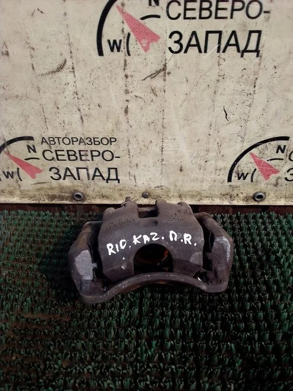 Суппорт Kia Rio 58130H5250 G4FG, передний правый