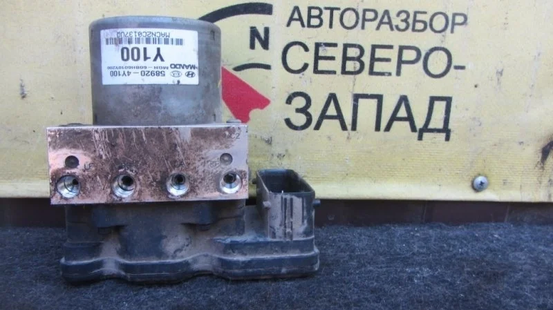 Блок управления ABS Kia Rio 589204Y100 QB G4FC