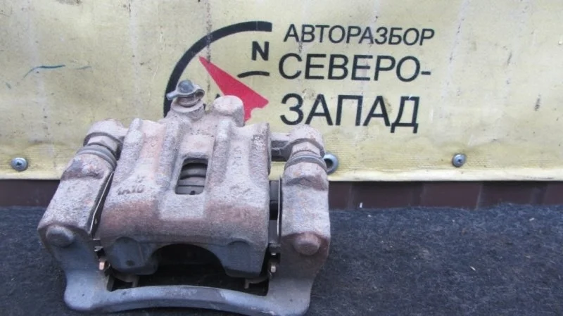 Суппорт Kia Ceed 582101H300 ED G4FA, задний левый