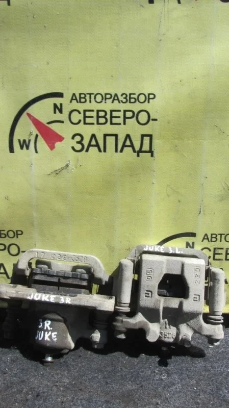 Суппорт тормозной Nissan Juke 44011EM11A YF15 HR16DE, задний левый