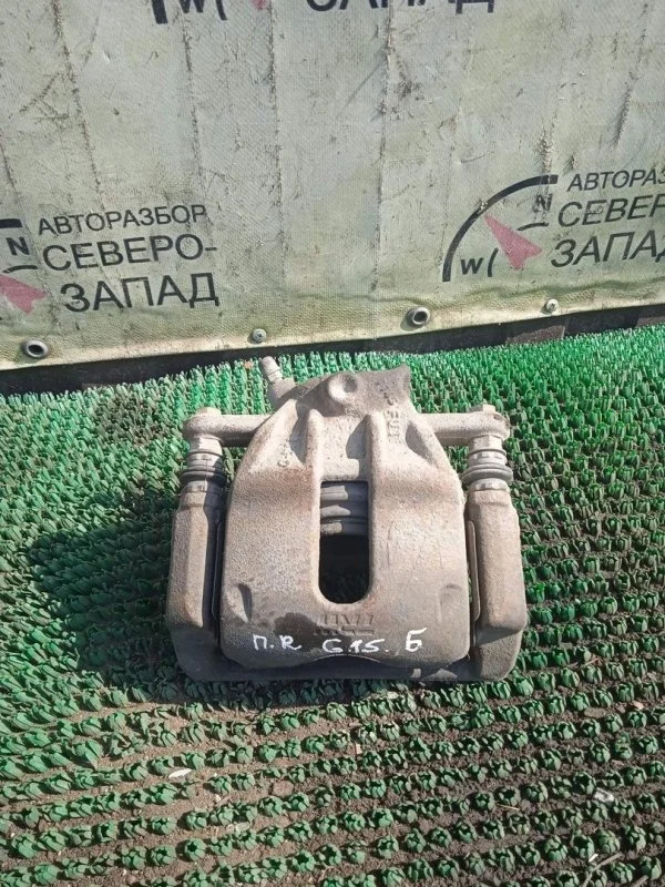 Суппорт Nissan Almera 4100100Q0F G15 K4M, передний правый