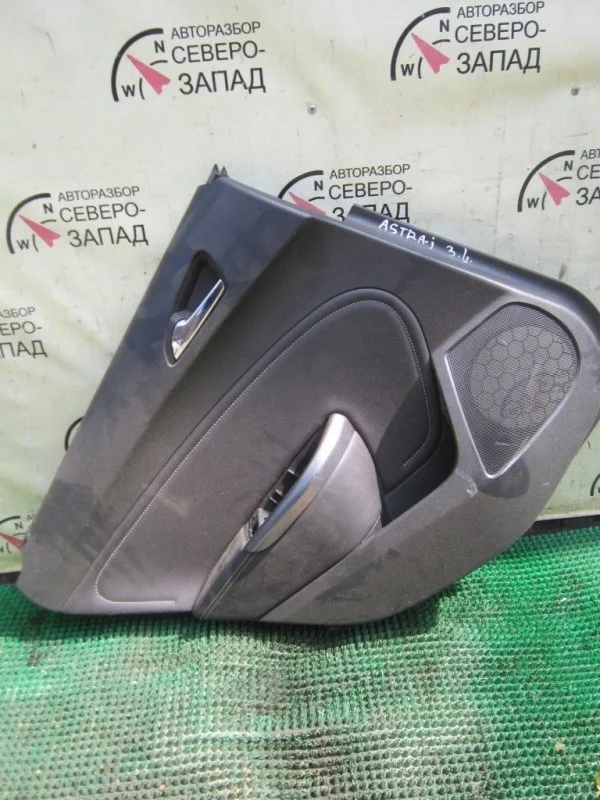 Обшивка дверей Opel Astra 13258735 J A16XER, задняя левая