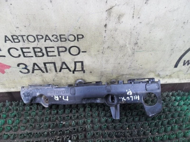 Кронштейн бампера Toyota Hilux 521150K070 KUN25 2KDFTV, передний правый