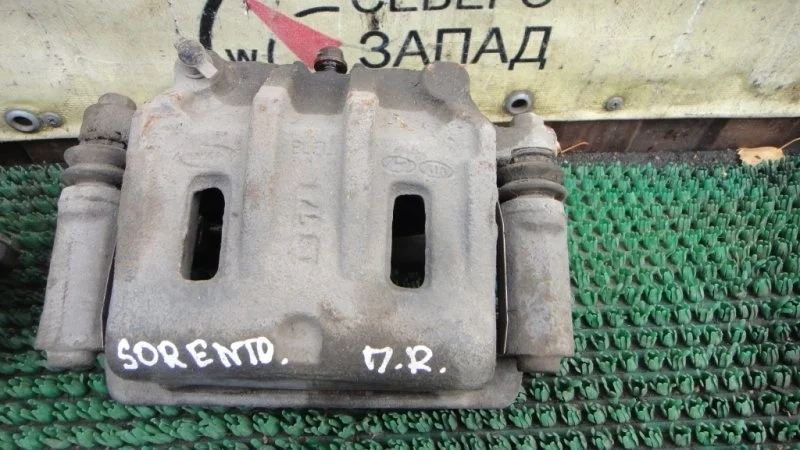 Суппорт Kia Sorento 581303E600 BL D4CB, передний правый