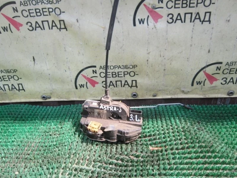 Замок двери Opel Astra 13579557 J, задний левый