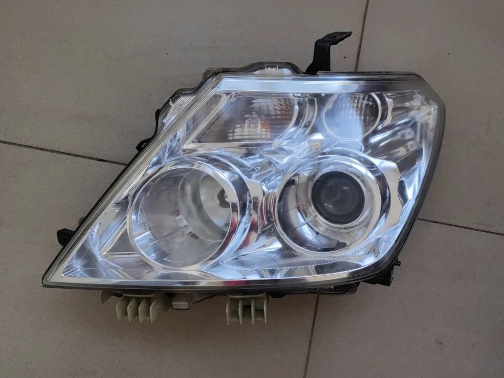 Фара Nissan Patrol 260601LB1A Y62 VK56VD, левая