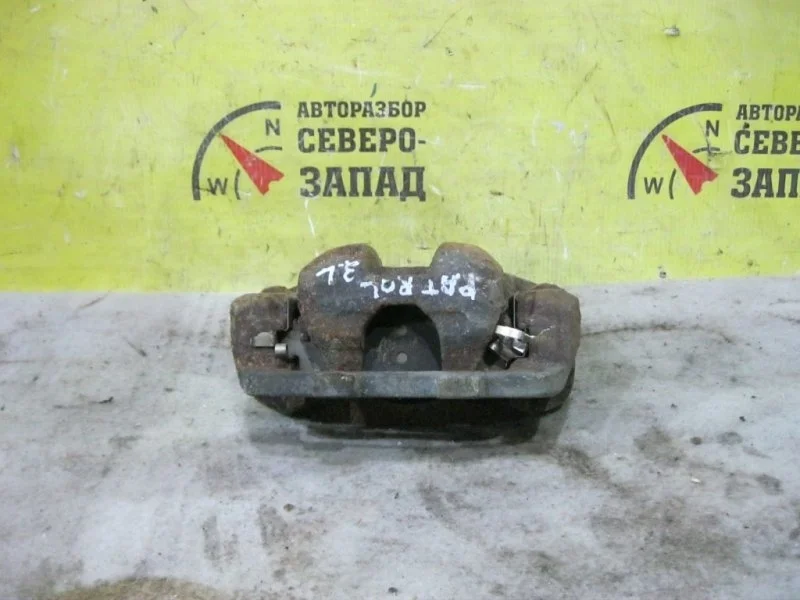 Суппорт тормозной Nissan Patrol 440111LB0A Y62, задний левый