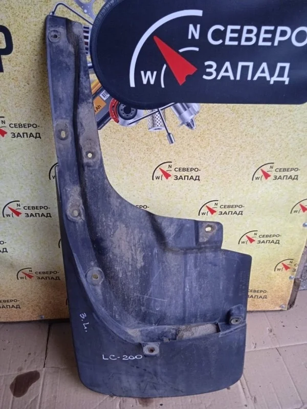 Брызговик Toyota Land Cruiser 7662660240 VDJ200, задний левый