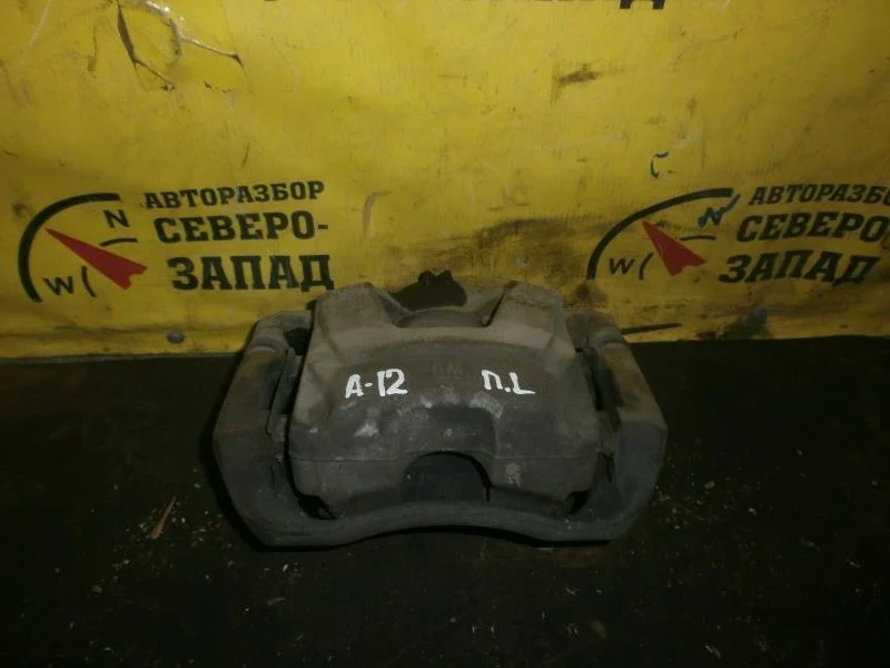 Суппорт тормозной Chevrolet Aveo 13301189 T300 F16D4, передний левый