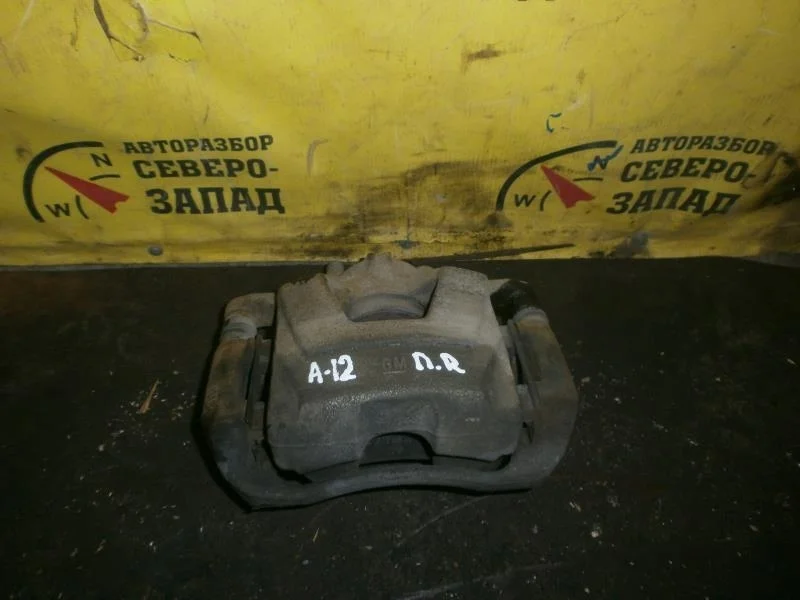 Суппорт тормозной Chevrolet Aveo 13301190 T300 F16D4, передний правый