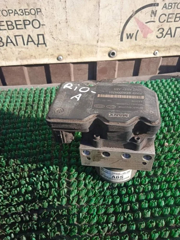 Блок управления ABS Kia Rio 2013 589204L100 QB G4FA