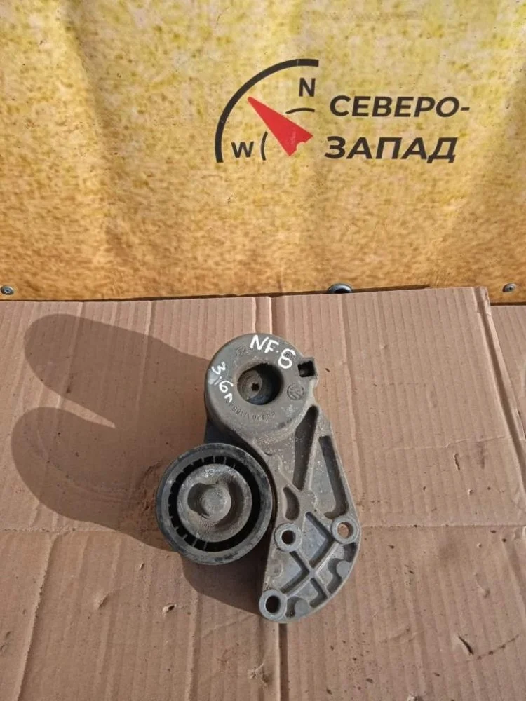 Натяжитель ремня генератора Volkswagen Touareg 2011 022145299E NF CMTA