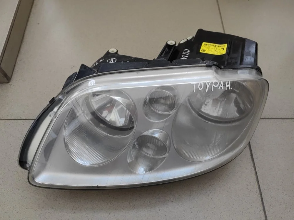 Фара Volkswagen Touran 2005 1305235777 1, левая