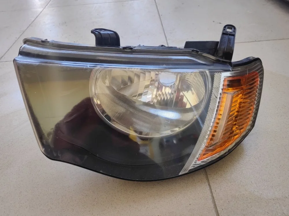 Фара Mitsubishi L200 2011 MN146195 KB4T 4D56, левая