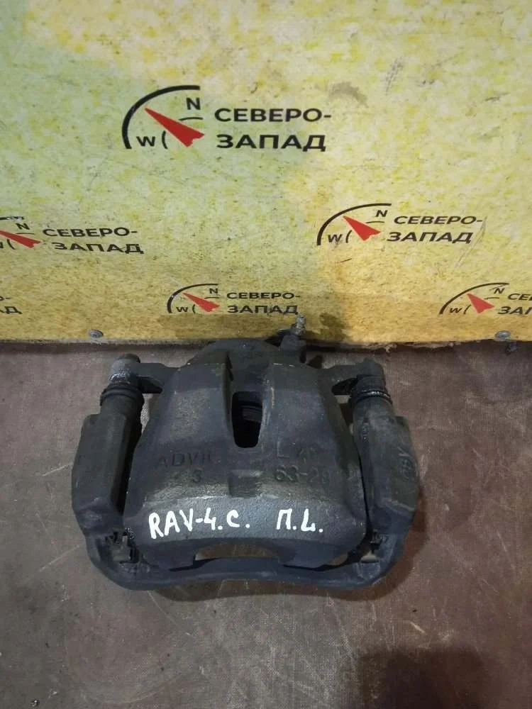 Суппорт тормозной Toyota Rav4 2008 4775042091 ACA30 1AZFE, передний левый