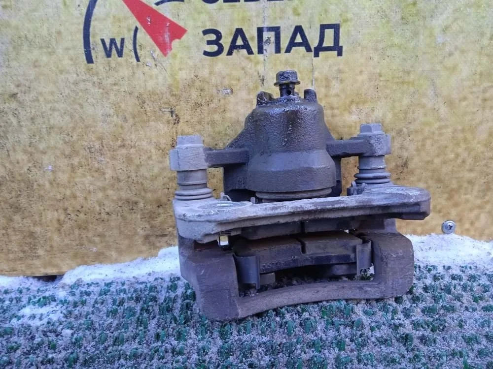 Суппорт Kia Ceed 2011 582101H300 ED G4FC, задний левый