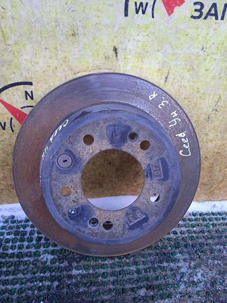 Диск тормозной Kia Ceed 2011 584111H100 ED G4FC, задний