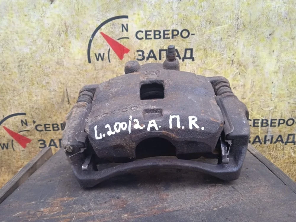 Суппорт Mitsubishi L200 2011 4605A202 KB4T 4D56-6-DFL, передний правый