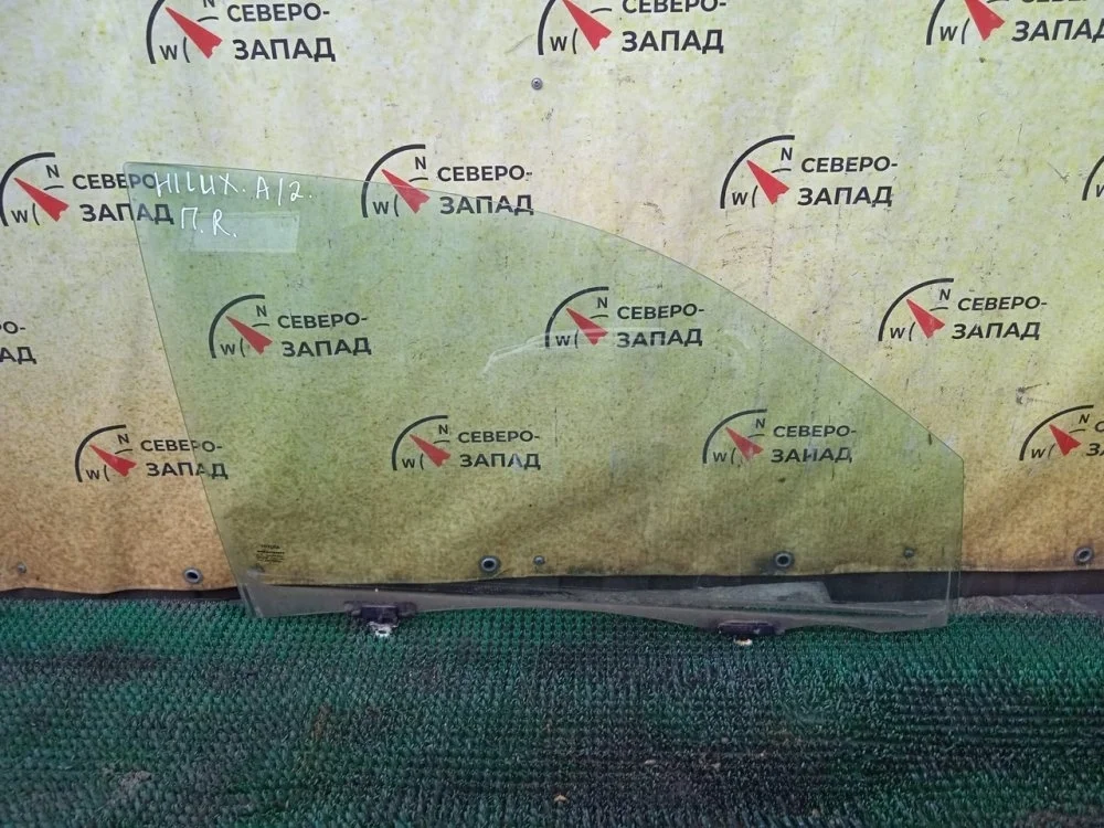 Стекло двери Toyota Hilux 2013 681010K021 KUN25 2KDFTV, переднее правое