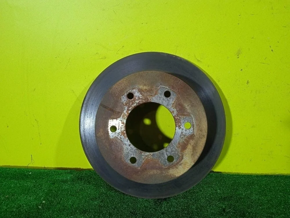 Диск тормозной Mitsubishi Pajero Sport 2010 4615A097 KH 4D56-6-DEL, задний