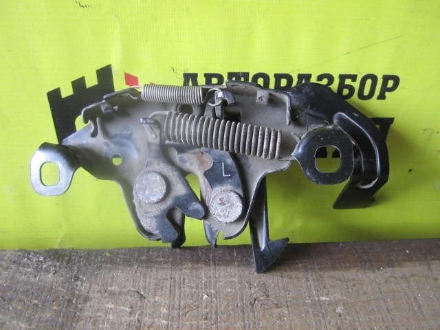 Замок капота Nissan Primera 65601AU800 P12