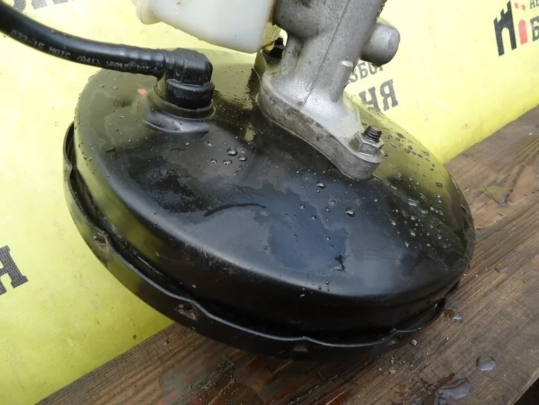 Вакум тормозной Nissan Almera D72104AA8A G15 K4MC697