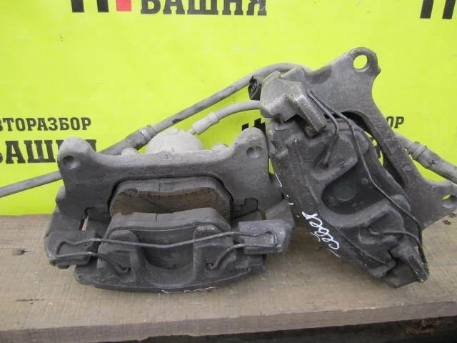 Суппорт тормозной Volkswagen Passat CC 1K0615123E, передний левый