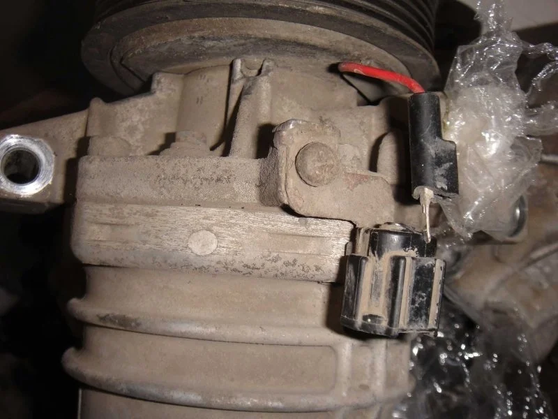 Компрессор кондиционера Nissan Tiida 92600CJ70B C11