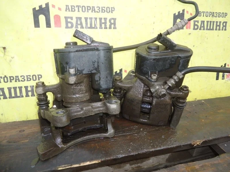 Суппорт тормозной Audi Q3 5N0615403, задний левый