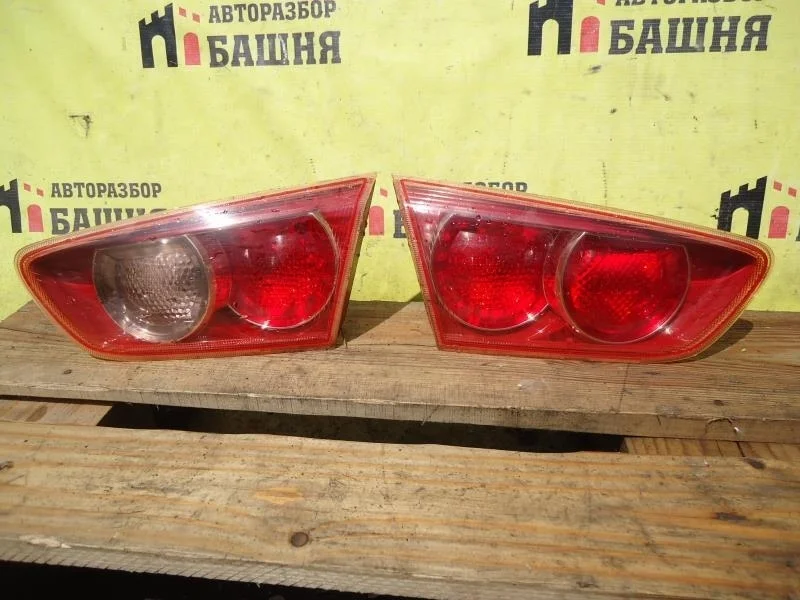 Фонарь Mitsubishi Lancer 8337A079 CY, левый