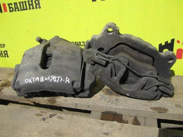 Суппорт Skoda Octavia 1K0615124D, передний правый