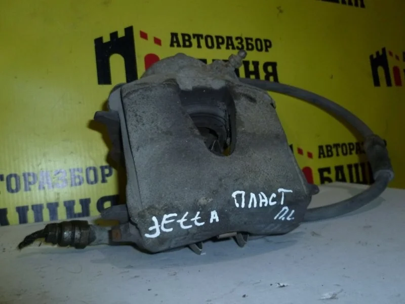 Суппорт Volkswagen Jetta 1K0615123D, передний левый