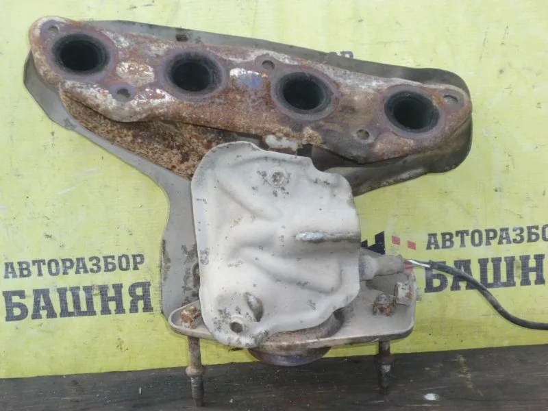 Коллектор выпускной Nissan Tiida 14002EE00A C11